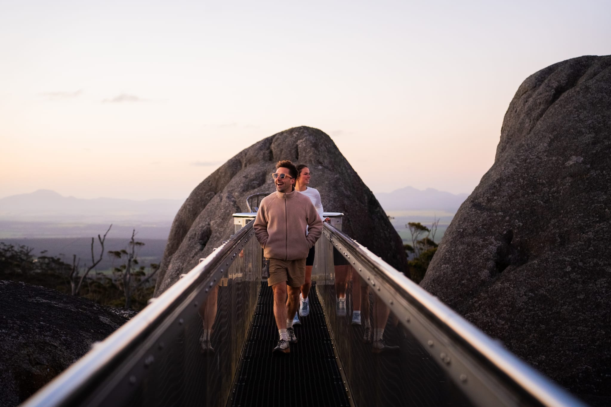 Granite Skywalk, Roady, Great Southern Region (7)-web Two people walking across the Granite Skywalk in Porongurup National Park